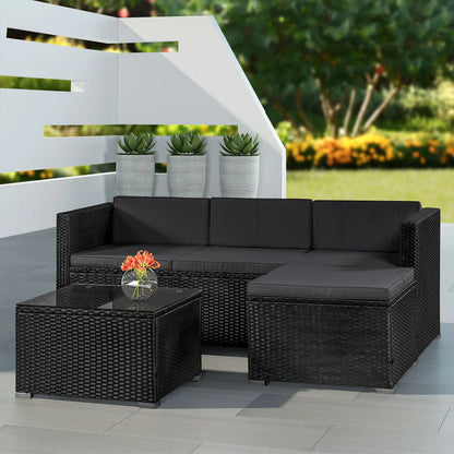 Polyrattan Lounge Punta Cana M set di sedute nere con 1 tavolo, 1 divano e 1 sgabello